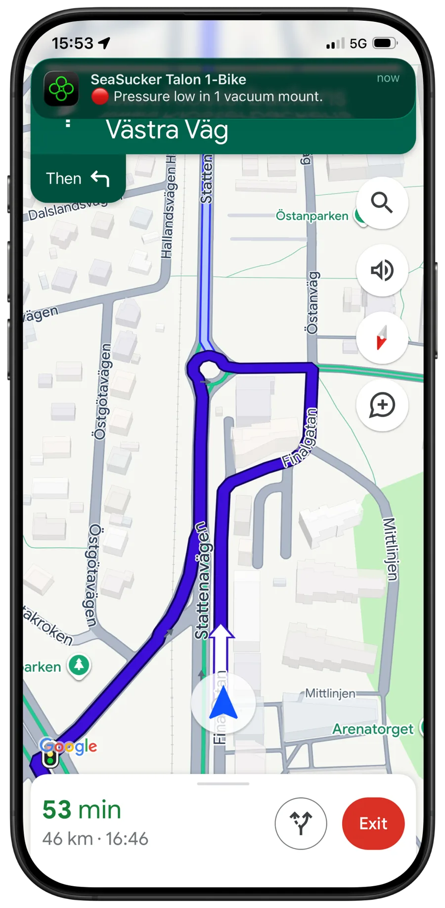 iPhone showing turn-by-turn navigation with a Kraken notification: pressure low in 1 vacuum mount