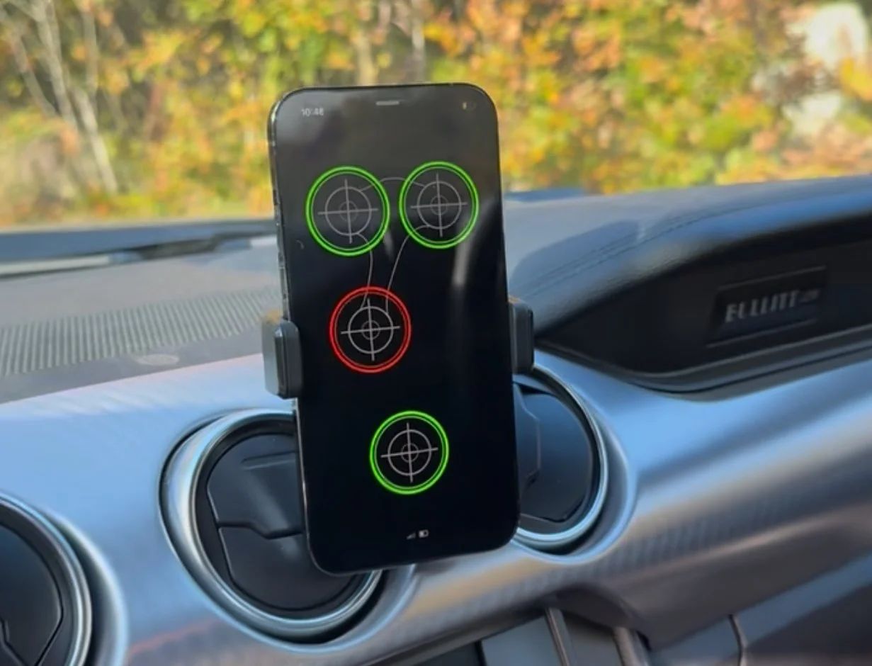 Kraken Rack Monitor app in tactical view on a phone mounted in the car